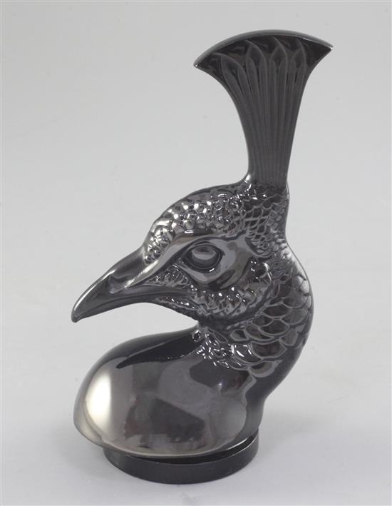 Tête de Paon/Peacocks head. A glass mascot by René Lalique, introduced on 3/2/1928, No.11876 Height 17.4cm.